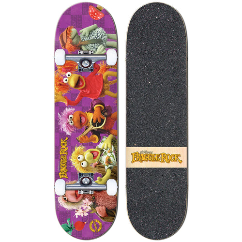 A complete skateboard featuring colorful artwork with characters from the Fraggle Rock series on the top surface, and a black grip tape on the bottom.