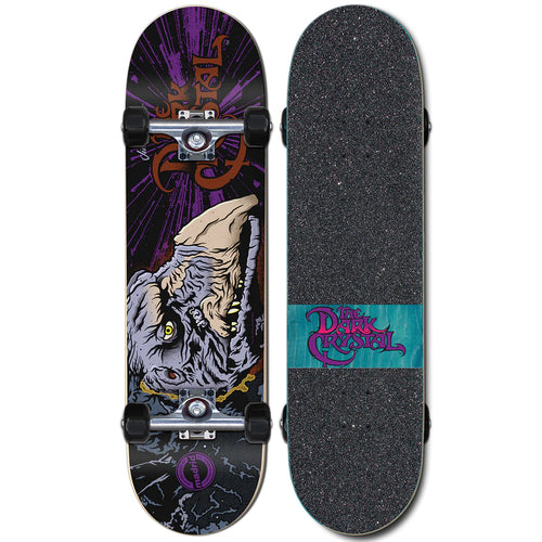 A complete skateboard featuring colorful artwork with 'The Dark Crystal' graphic and text 
