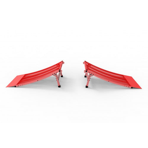 Two red BMX jumps with rubber feet, positioned on a white background.